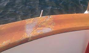 older varnished wood boat rails
